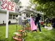 Wide view of suburban yard sale